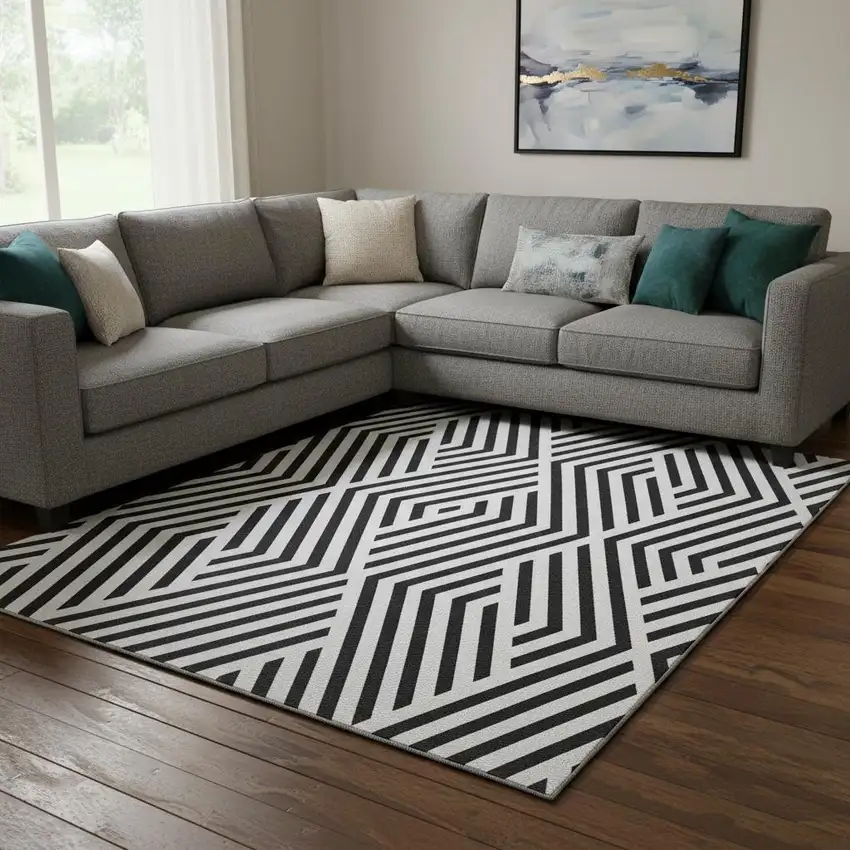 Black And Ivory Geometric Washable Area Rug With UV Protection Photo 1