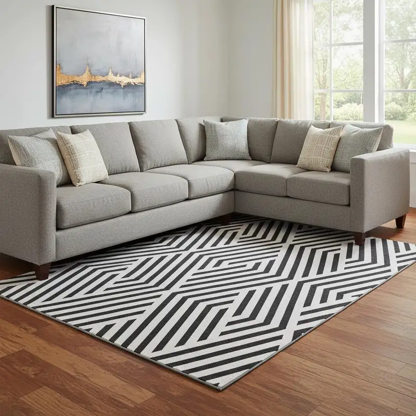 Black And Ivory Geometric Washable Area Rug With UV Protection Photo 1