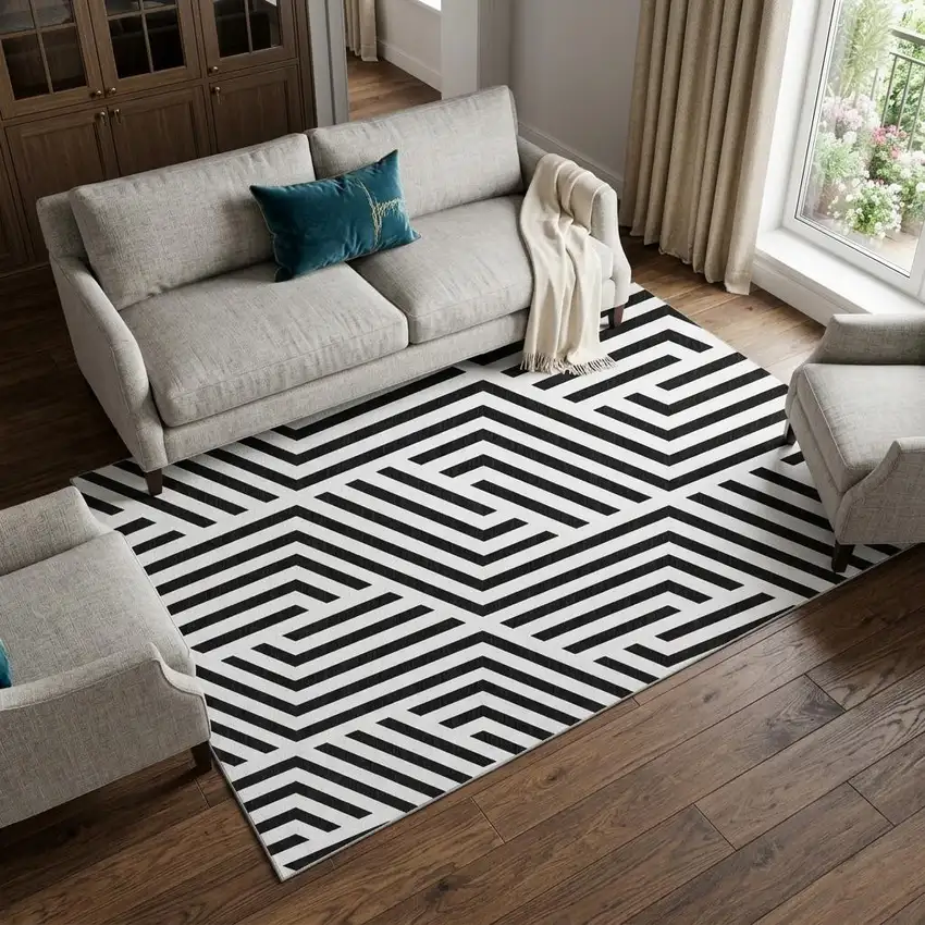 Black And Ivory Geometric Washable Area Rug With UV Protection Photo 1