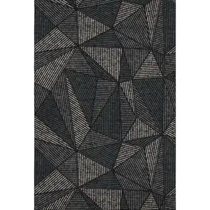 Photo of Black And Ivory Geometric Washable Area Rug With UV Protection