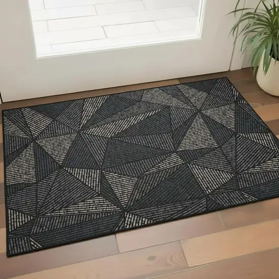Black And Ivory Geometric Washable Area Rug With UV Protection Photo 1