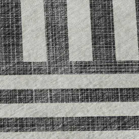 Black And Ivory Geometric Washable Area Rug With UV Protection Photo 2