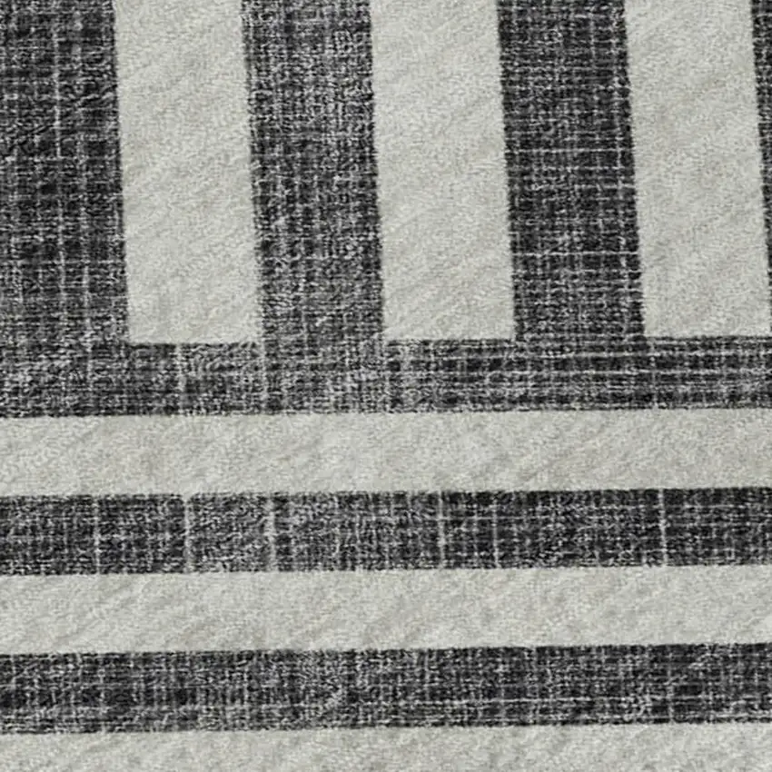 Black And Ivory Geometric Washable Area Rug With UV Protection Photo 2