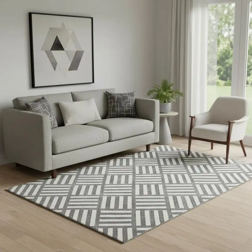 Black And Ivory Geometric Washable Area Rug With UV Protection Photo 1