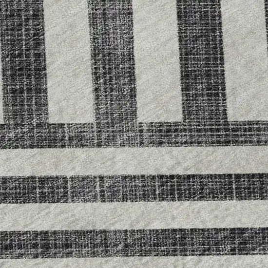Black And Ivory Geometric Washable Area Rug With UV Protection Photo 2