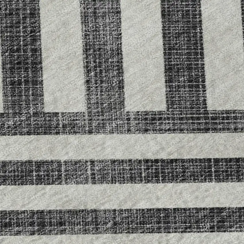 Black And Ivory Geometric Washable Area Rug With UV Protection Photo 2