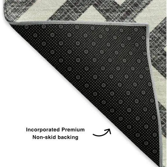 Black And Ivory Geometric Washable Area Rug With UV Protection Photo 5
