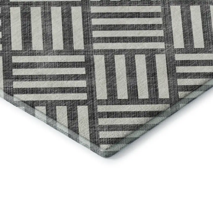 Black And Ivory Geometric Washable Area Rug With UV Protection Photo 1