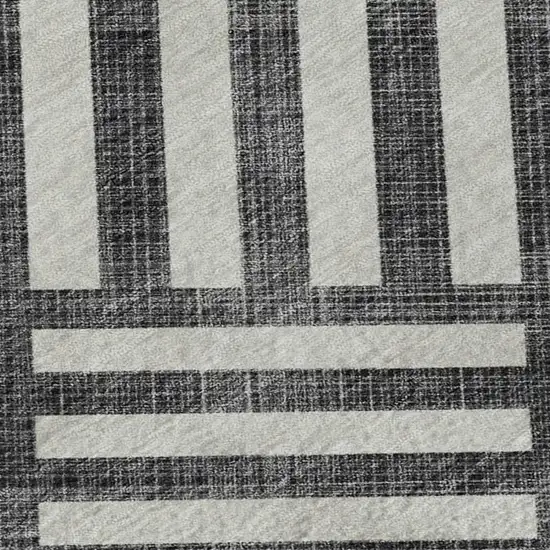 Black And Ivory Geometric Washable Area Rug With UV Protection Photo 2