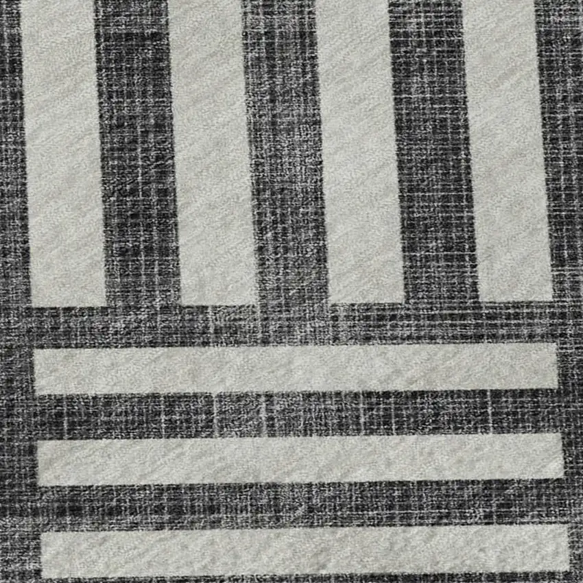 Black And Ivory Geometric Washable Area Rug With UV Protection Photo 2