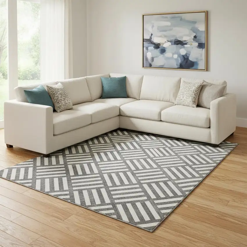 Black And Ivory Geometric Washable Area Rug With UV Protection Photo 1