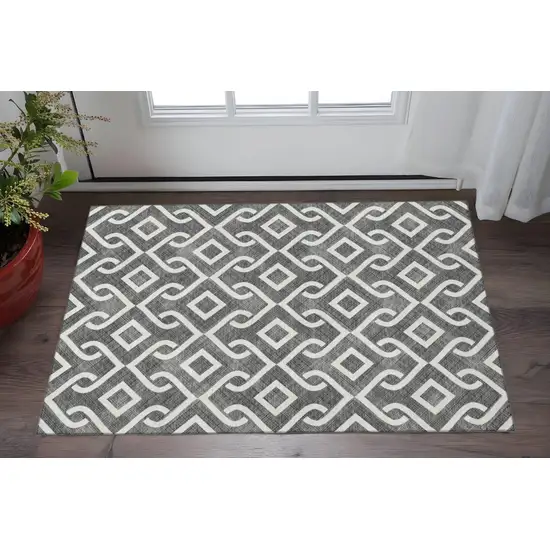 Black And Ivory Geometric Washable Area Rug With UV Protection Photo 2