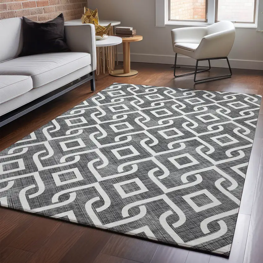 Black And Ivory Geometric Washable Area Rug With UV Protection Photo 3