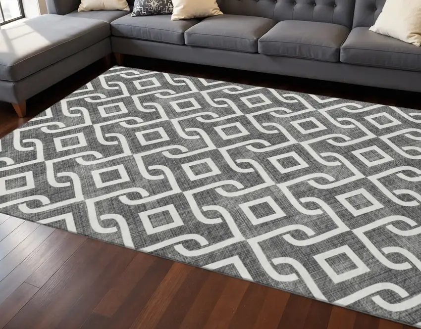 Black And Ivory Geometric Washable Area Rug With UV Protection Photo 2
