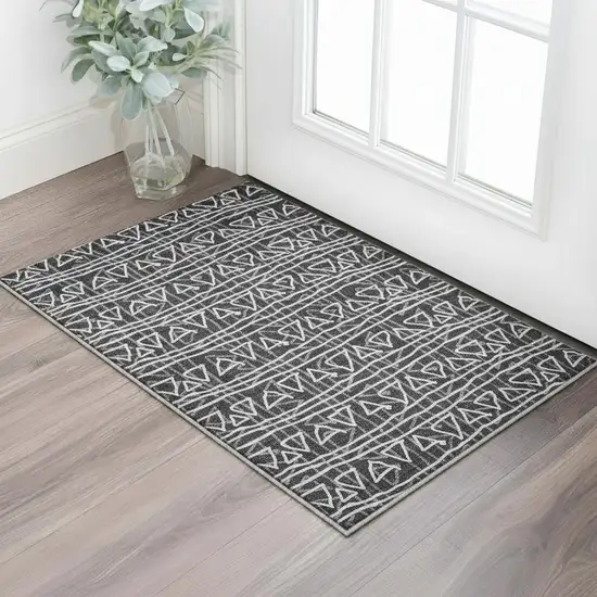 Black And Ivory Geometric Washable Area Rug With UV Protection Photo 2