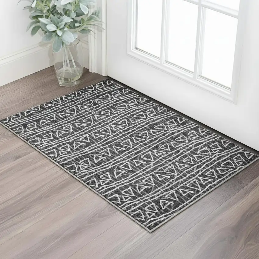 Black And Ivory Geometric Washable Area Rug With UV Protection Photo 2