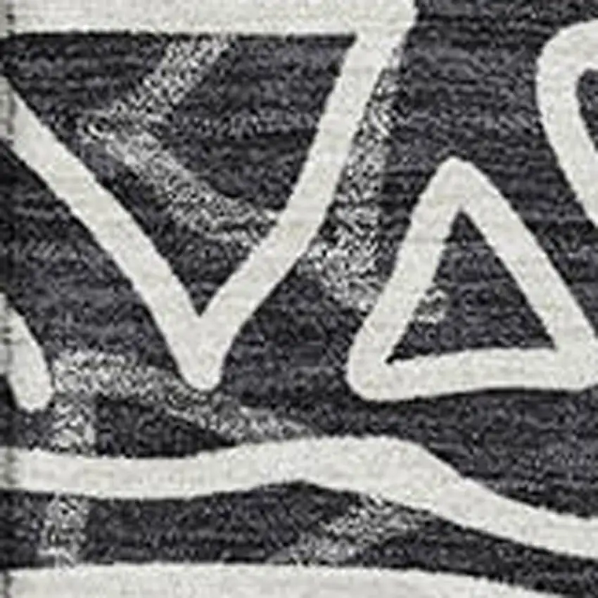 Black And Ivory Geometric Washable Area Rug With UV Protection Photo 3
