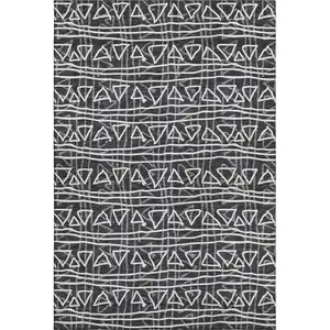 Photo of Black And Ivory Geometric Washable Area Rug With UV Protection
