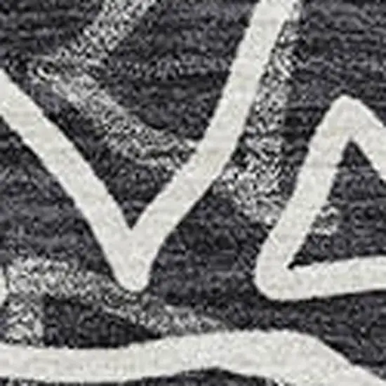 Black And Ivory Geometric Washable Area Rug With UV Protection Photo 3