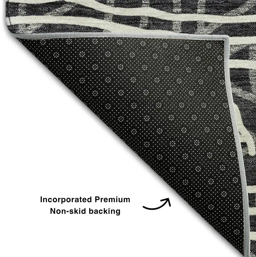 Black And Ivory Geometric Washable Area Rug With UV Protection Photo 7