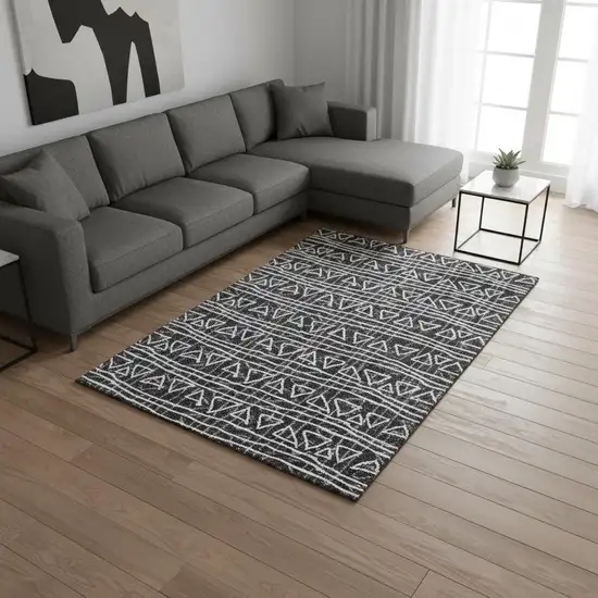 Black And Ivory Geometric Washable Area Rug With UV Protection Photo 2