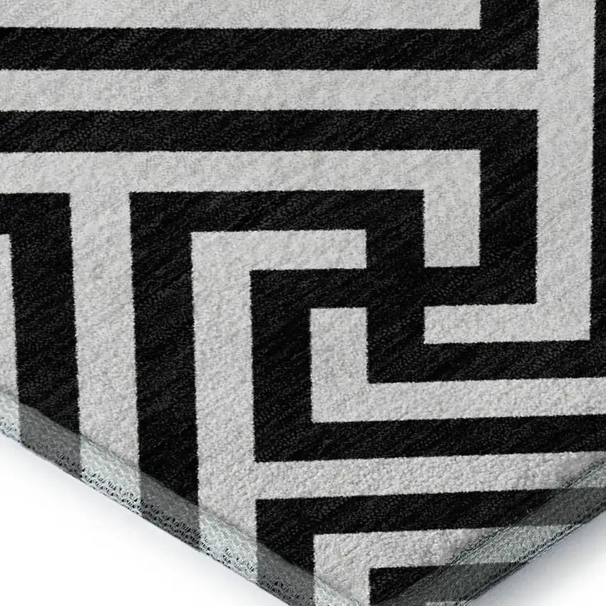 Black And Ivory Geometric Washable Area Rug With UV Protection Photo 3