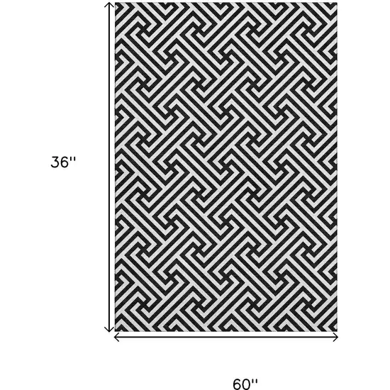 Black And Ivory Geometric Washable Area Rug With UV Protection Photo 3