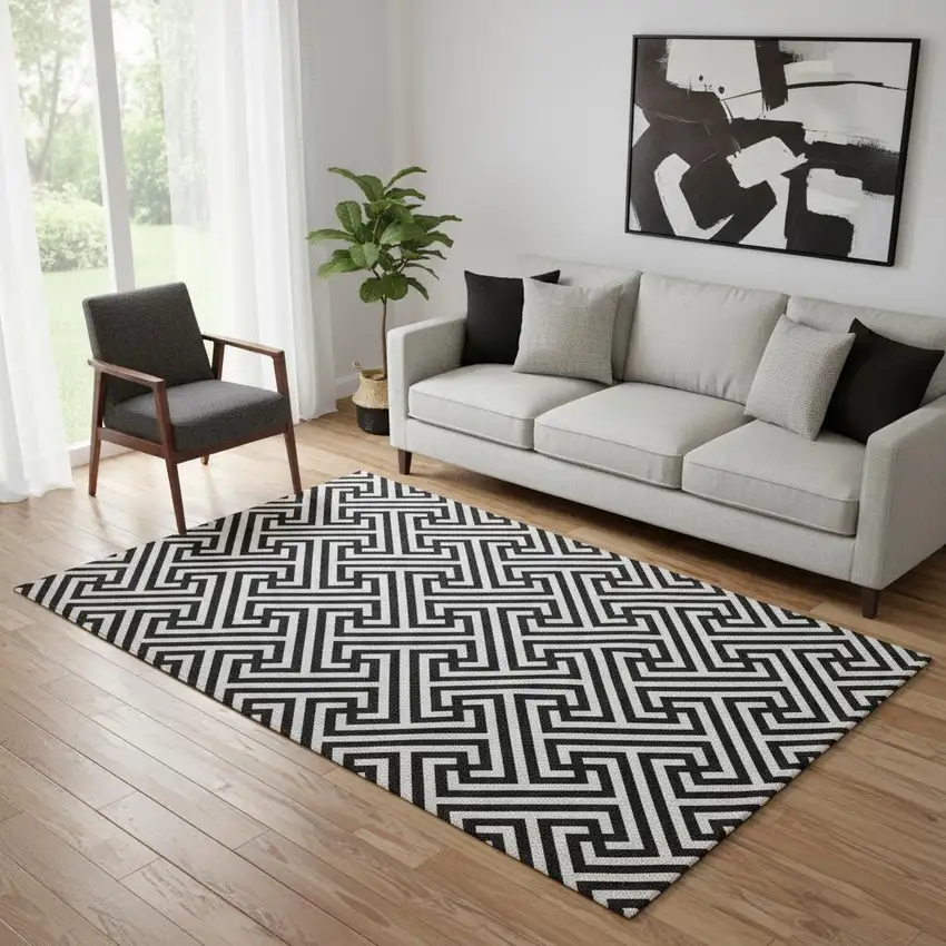 Black And Ivory Geometric Washable Area Rug With UV Protection Photo 1