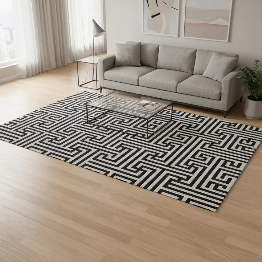 Black And Ivory Geometric Washable Area Rug With UV Protection Photo 2