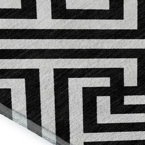 Black And Ivory Geometric Washable Area Rug With UV Protection Photo 3