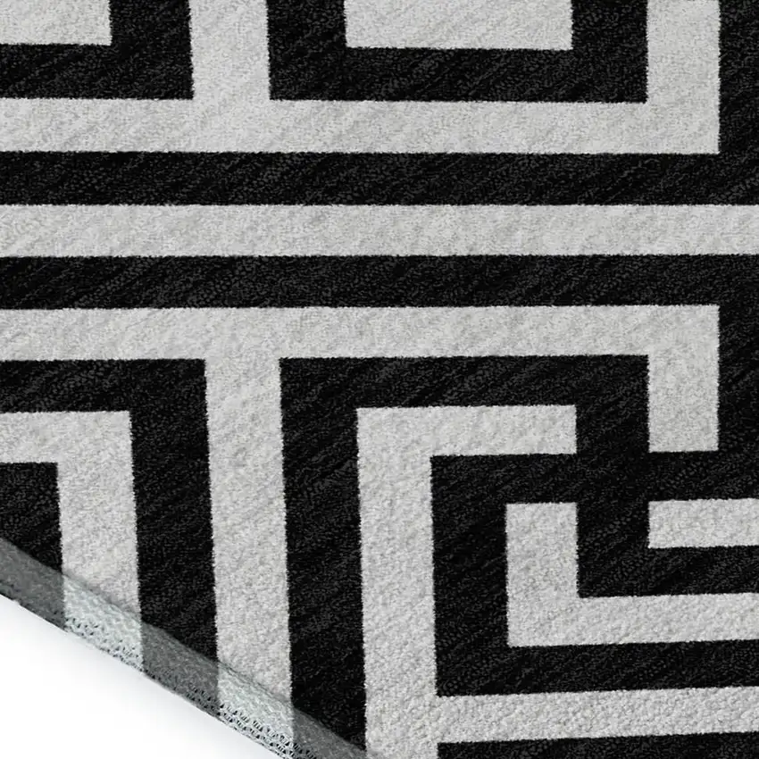 Black And Ivory Geometric Washable Area Rug With UV Protection Photo 3