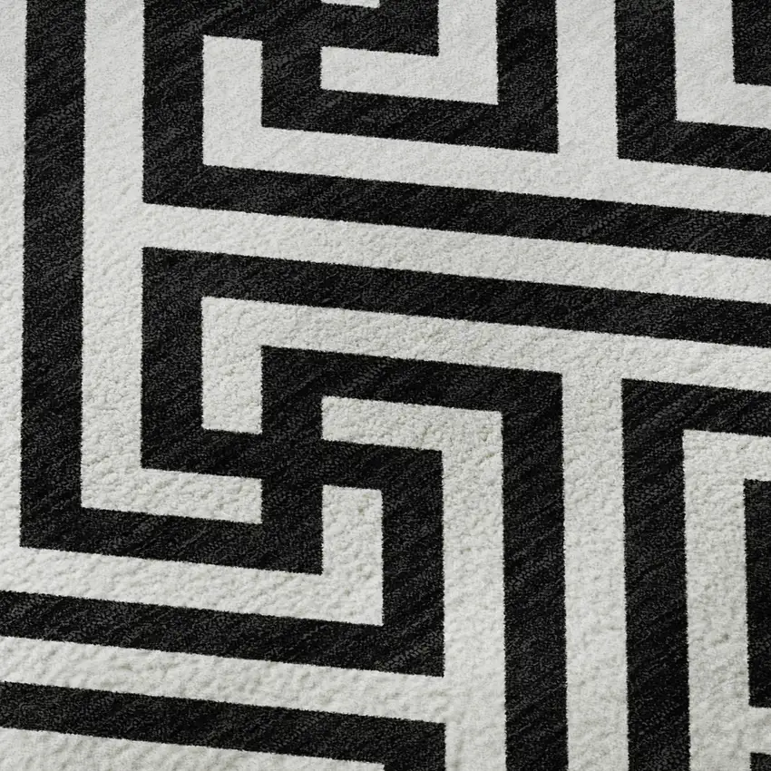 Black And Ivory Geometric Washable Area Rug With UV Protection Photo 9