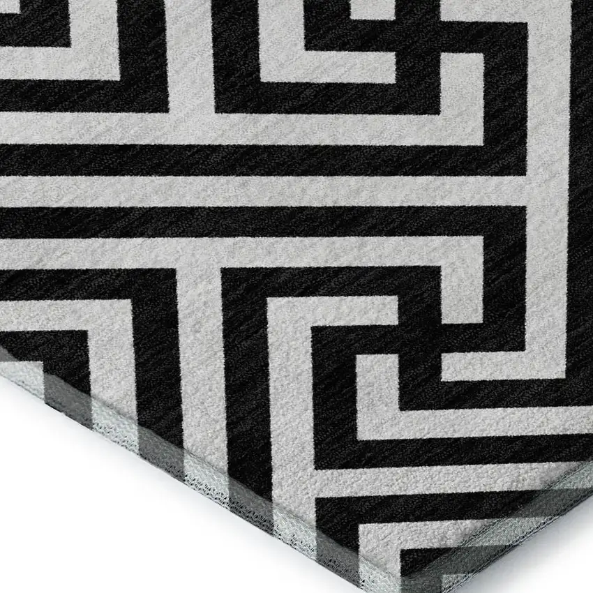 Black And Ivory Geometric Washable Area Rug With UV Protection Photo 3
