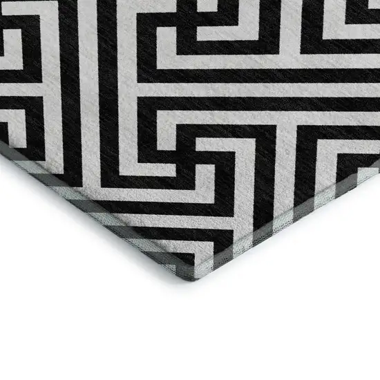 Black And Ivory Geometric Washable Area Rug With UV Protection Photo 4