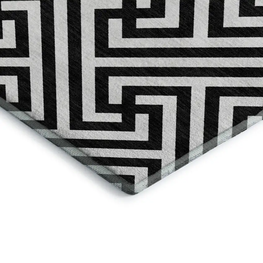 Black And Ivory Geometric Washable Area Rug With UV Protection Photo 4