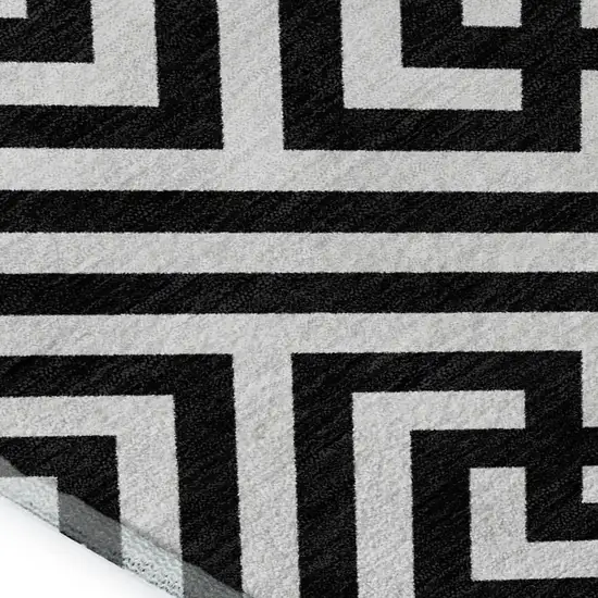Black And Ivory Geometric Washable Area Rug With UV Protection Photo 3