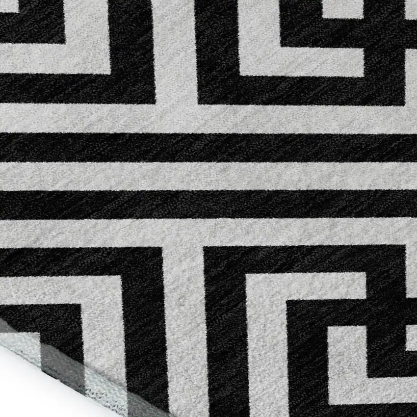 Black And Ivory Geometric Washable Area Rug With UV Protection Photo 3
