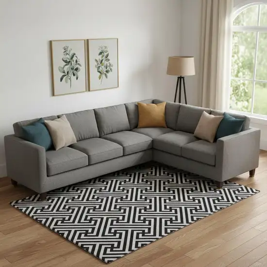 Black And Ivory Geometric Washable Area Rug With UV Protection Photo 1