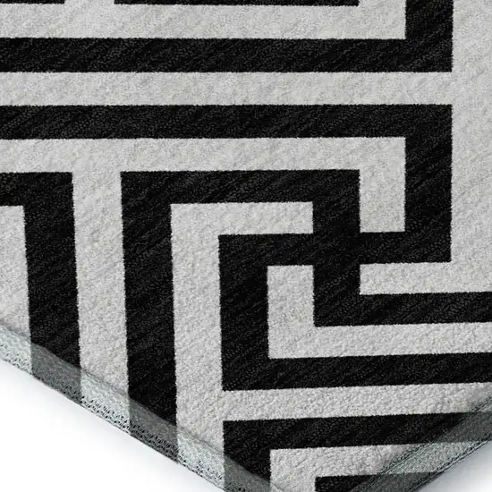 Black And Ivory Geometric Washable Area Rug With UV Protection Photo 3