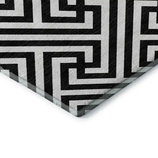 Black And Ivory Geometric Washable Area Rug With UV Protection Photo 1