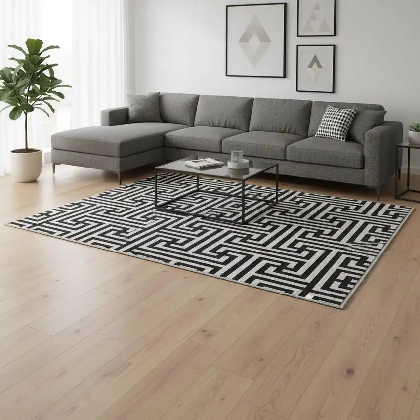 Black And Ivory Geometric Washable Area Rug With UV Protection Photo 2