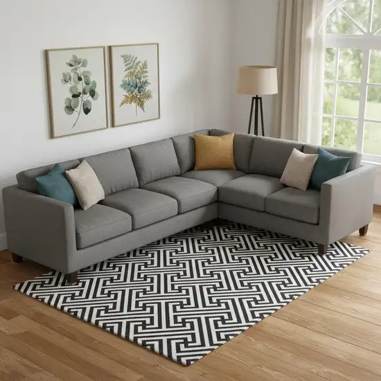 Black And Ivory Geometric Washable Area Rug With UV Protection Photo 1