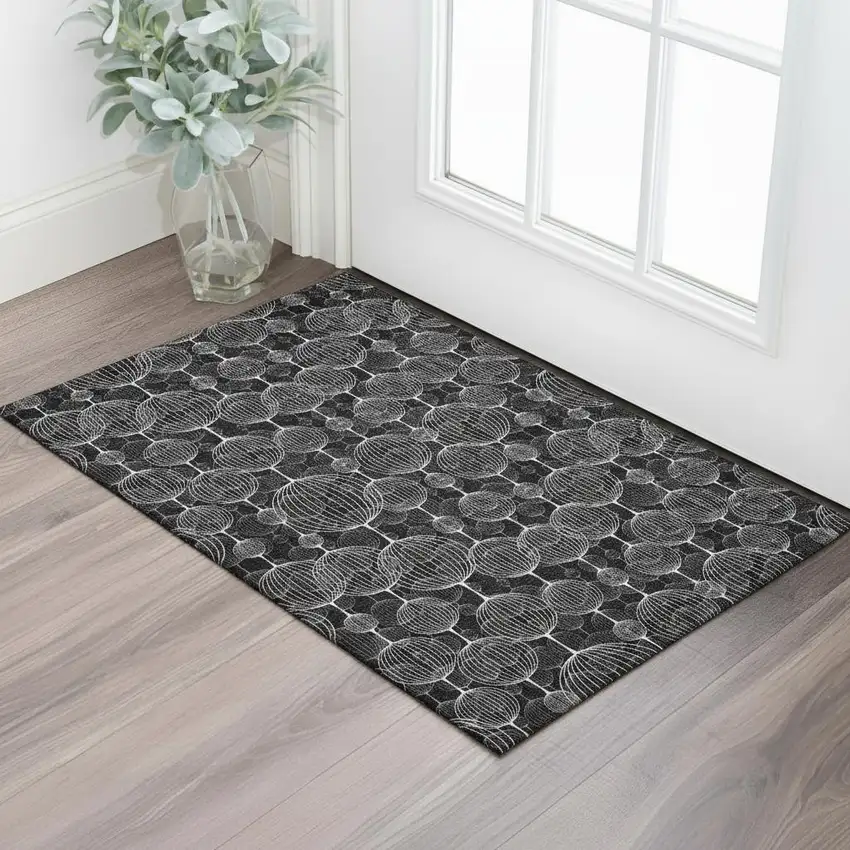 Black And Ivory Geometric Washable Area Rug With UV Protection Photo 2