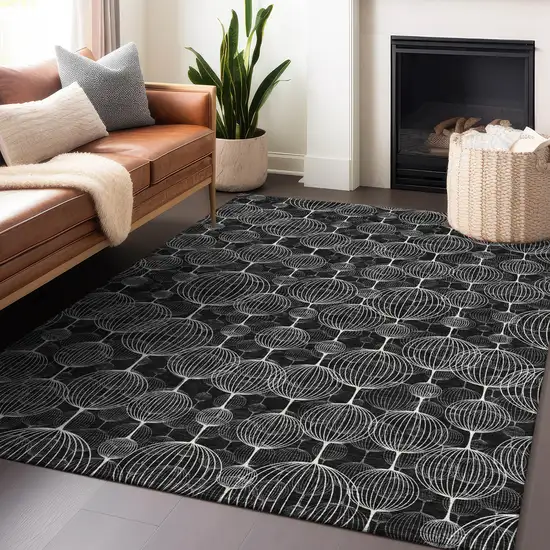 Black And Ivory Geometric Washable Area Rug With UV Protection Photo 6