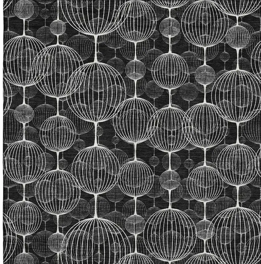 Black And Ivory Geometric Washable Area Rug With UV Protection Photo 3
