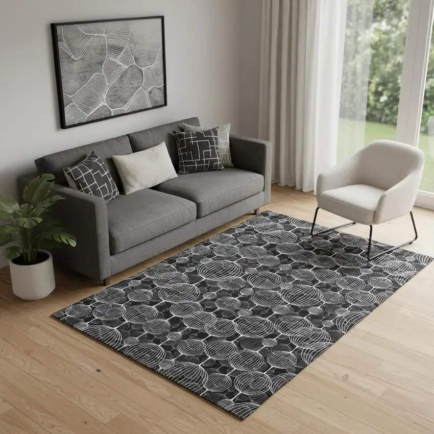 Black And Ivory Geometric Washable Area Rug With UV Protection Photo 1