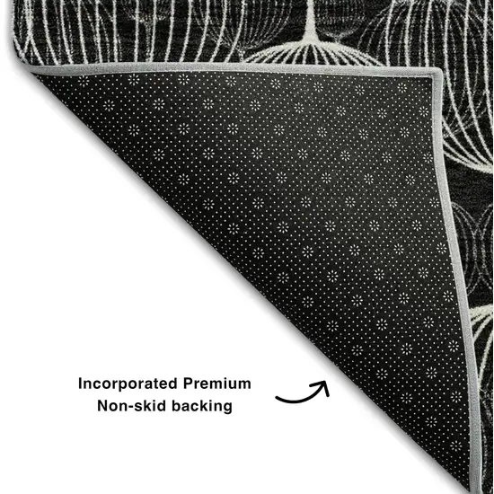 Black And Ivory Geometric Washable Area Rug With UV Protection Photo 8