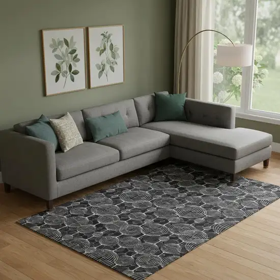 Black And Ivory Geometric Washable Area Rug With UV Protection Photo 1