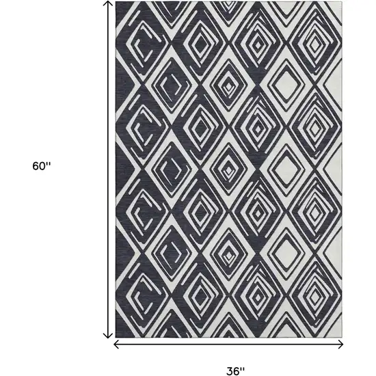 Black And Ivory Geometric Washable Area Rug With UV Protection Photo 3