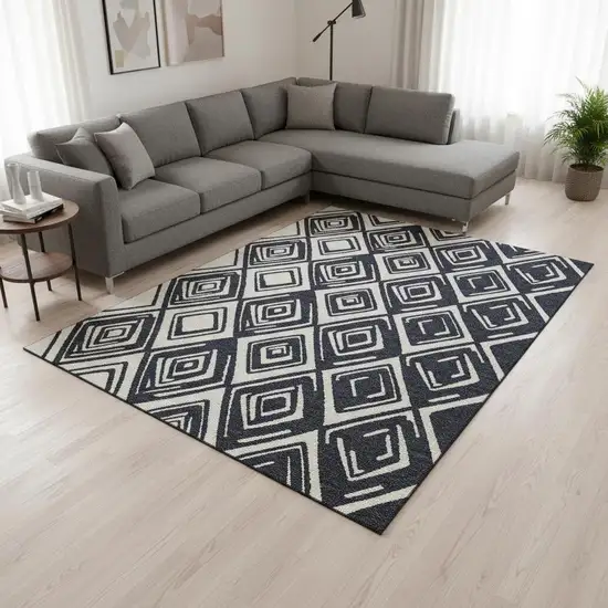 Black And Ivory Geometric Washable Area Rug With UV Protection Photo 2